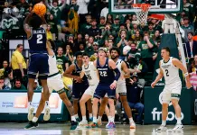 2026 Mountain West Conference Basketball Tournament Odds & Predictions Utah State guard MJ Collins Jr. takes a shot during the 2025-26 college basketball season.