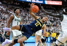 Four NCAA Tournament Automatic Bids on the Line Sunday as Champ Week Heats Up Michigan Wolverines guard Roddy Gayle Jr.
