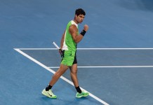 Indian Wells Predictions: 2026 BNP Paribas Open tournament futures and tennis best bets Carlos Alcaraz celebrates a point won against Novak Djokovic at the 2026 Australian Open.