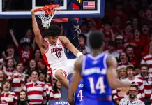 2026 Big 12 Conference Basketball Tournament Odds & Predictions Arizona freshman Koa Peat dunks against Kansas during the 2025-26 college basketball season.