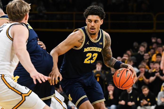 Michigan star Yaxel Lendeborg looks to make a play against Iowa during the 2025-26 college basketball season.
