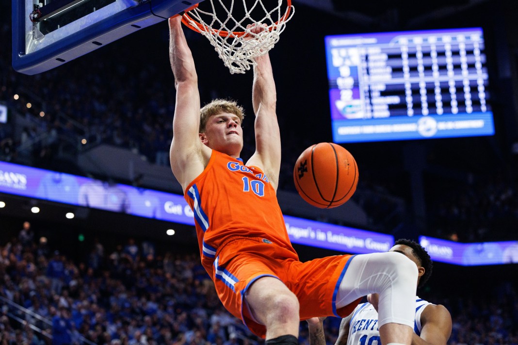 Florida star Thomas Haugh dunks against Kentucky during the 2025-26 college basketball season.