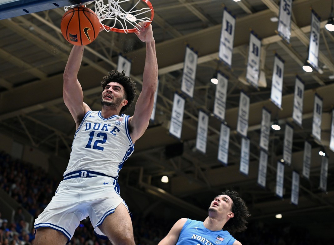 Duke superstar Cameron Boozer dunks in a meeting with North Carolina during the 2025-26 college basketball season.