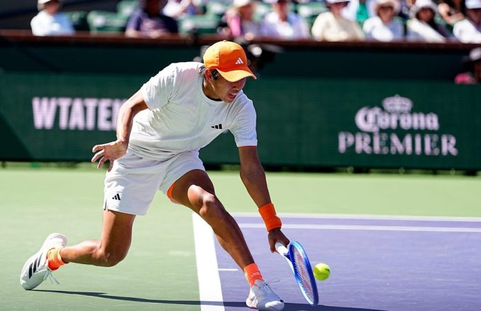 Learner Tien hits a backhand at the 2026 BNP Paribas Open at Indian Wells.