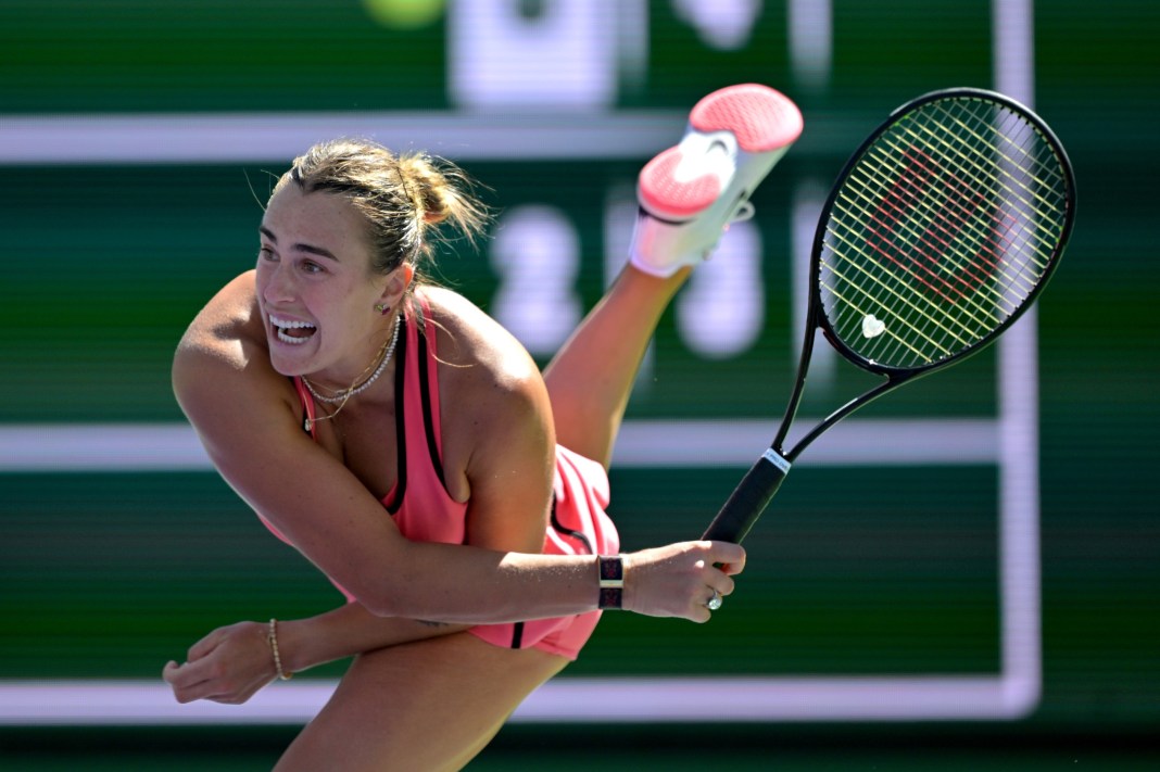 Aryna Sabalenka serves against Naomi Osaka during the 2026 BNP Paribas Open in Indian Wells.