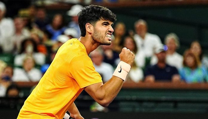 Carlos Alcaraz celebrates a point against Cam Norrie during the 2026 BNP Paribas Open in Indian Wells.