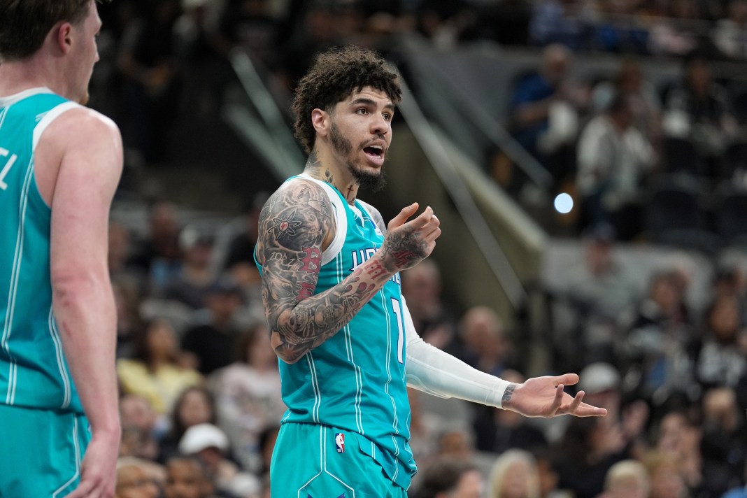 Hornets star LaMelo Ball reacts to a play against the Spurs during the 2025-26 NBA season.