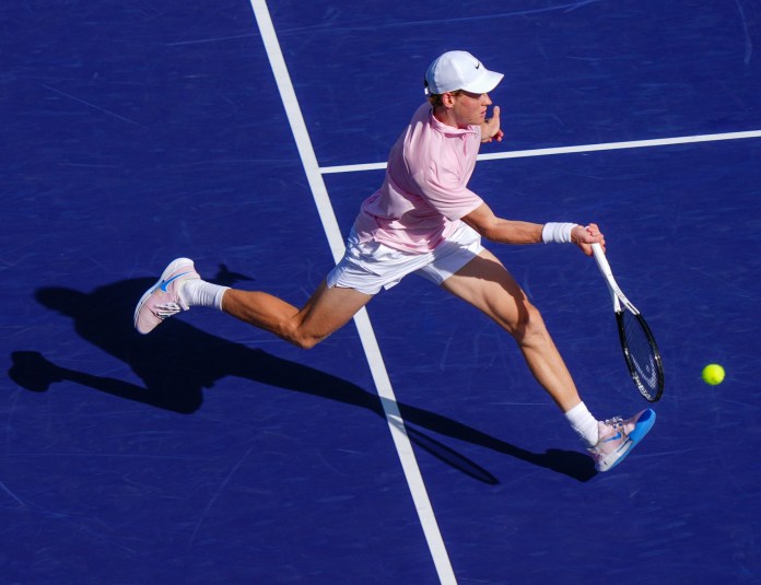 Jannik Sinner hits a forehand against Daniil Medvedev at the 2026 BNP Paribas Open in Indian Wells.