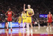 NBA Player Prop Picks Today: Top Prop Bets for Tuesday, March 31 Lakers guard Austin Reaves gets ready to shoot a free throw against the Rockets during the 2025-26 NBA season.