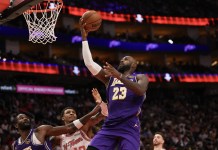NBA Picks & Predictions Today (March 19): Best Bets on Sides & Totals Lakers star LeBron James makes a layup against the Rockets during the 2025-26 NBA season.