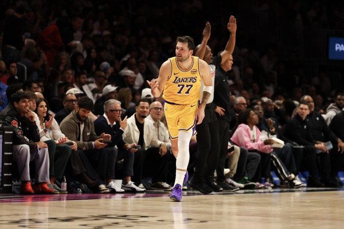 Lakers superstar Luka Doncic celebrates a shot against the Heat during the 2025-26 NBA season.