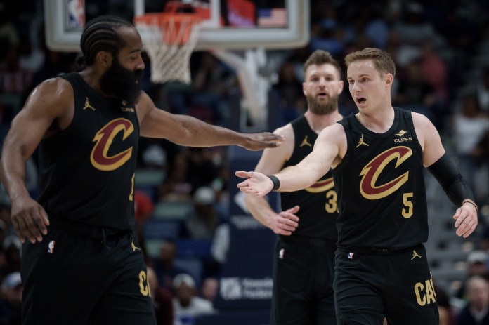Cavaliers players Sam Merrill and James Harden against the Pelicans during the 2025-26 NBA season.