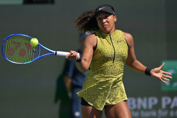 Naomi Osaka hits a forehand against Aryna Sabalenka at the 2026 BNP Paribas Open in Indian Wells.