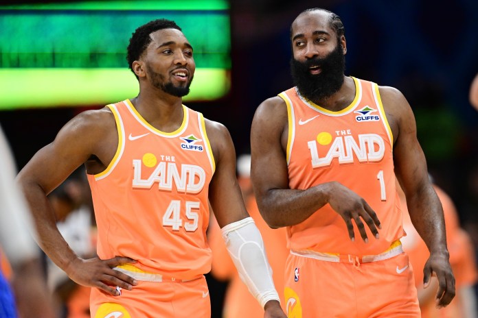 Cavaliers stars Donovan Mitchell and James Harden talk in a meeting with the Magic during the 2025-26 NBA season.