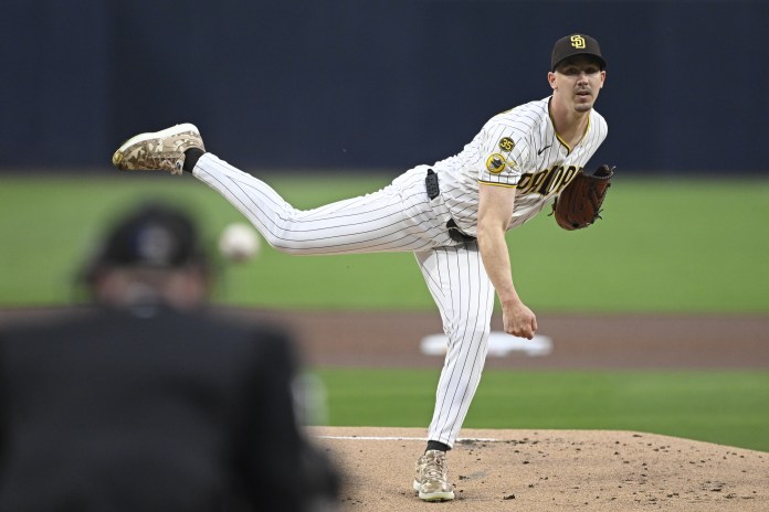 Padres starter Walker Buehler throws a pitch against the Giants during the 2026 MLB season.