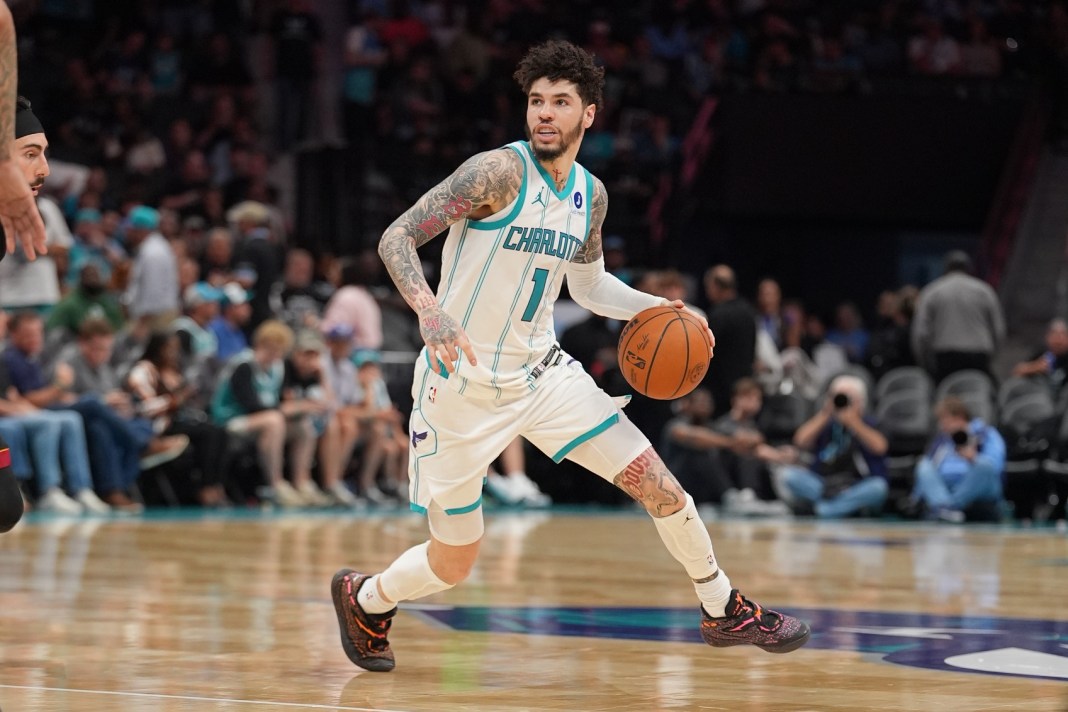 Hornets star LaMelo Ball looks to make a play against the Heat during the 2025-26 NBA season.