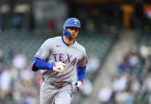 MLB Player Props Today: Top Picks for Tuesday, April 21 Rangers outfielder Brandon Nimmo hits a home run against the Mariners during the 2026 MLB season.