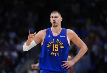2025-26 NBA Playoffs Predictions Today: Best Bets and Player Props – April 25 Nuggets superstar Nikola Jokic looks on against the Timberwolves during the 2025-26 NBA season.