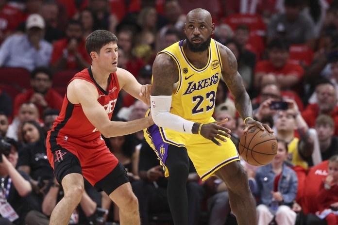 Lakers star LeBron James looks to score on Reed Sheppard in the 2025-26 NBA Playoffs.