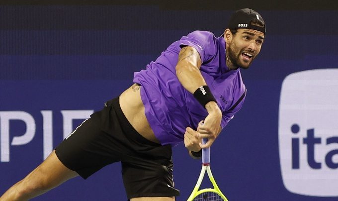 Matteo Berrettini serves against Taylor Fritz during the 2025 Miami Open.