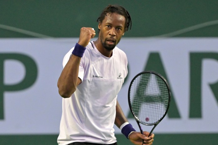 Gael Monfils celebrates a point against Alexis Galarneau at the 2026 BNP Paribas Open in Indian Wells.