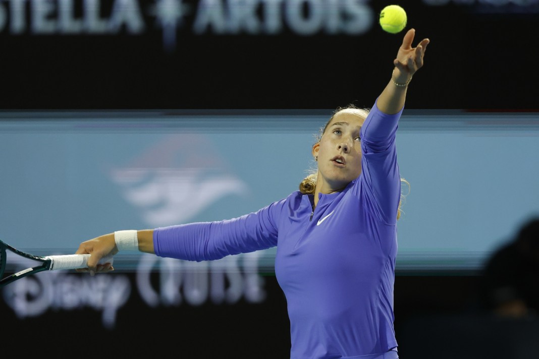 Mirra Andreeva serves against McCartney Kessler at the 2026 Miami Open.