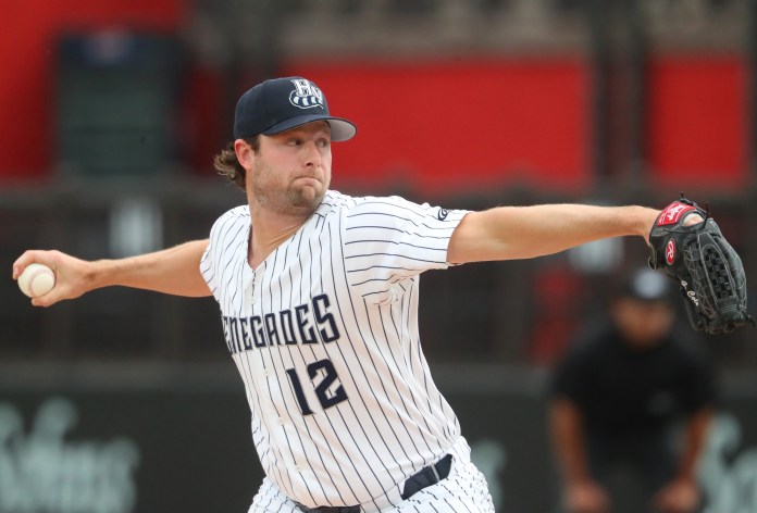 Yankees ace Gerrit Cole throws a pitch in the minors during the 2026 MILB season.