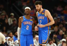 NBA Playoffs Series Preview: Thunder vs. Lakers Prediction Thunder stars Shai Gilgeous-Alexander and Chet Holmgren talk during a game against the Suns during the 2025-26 NBA Playoffs.