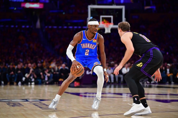 Thunder star Shai Gilgeous-Alexander drives against the Lakers during the 2025-26 NBA Playoffs.