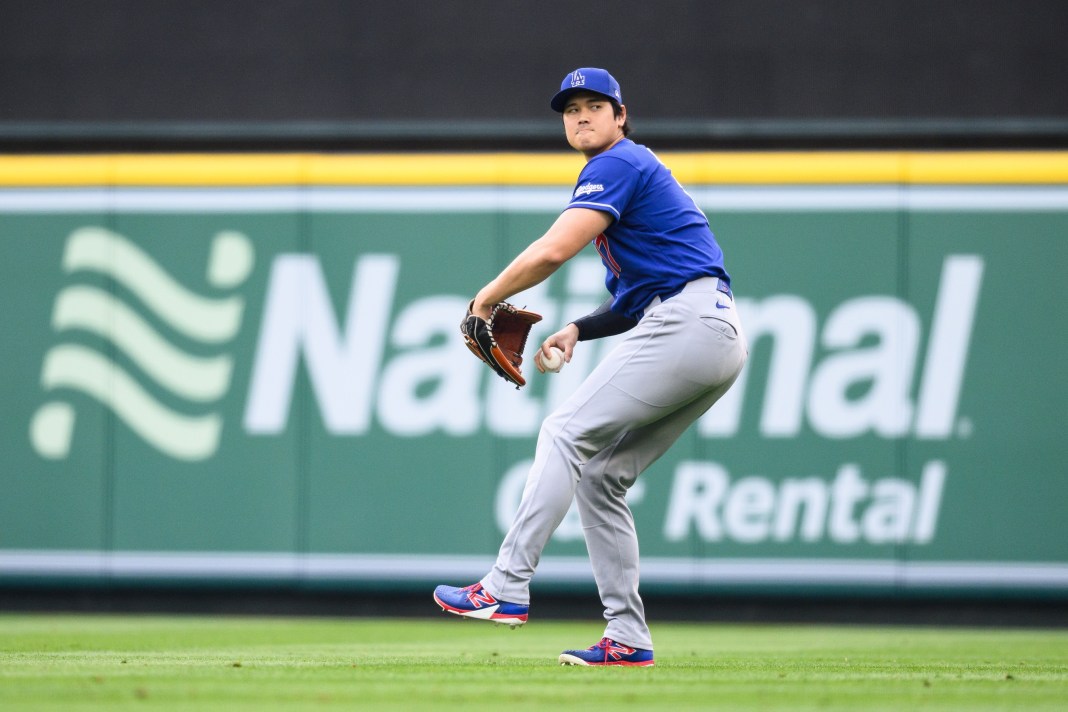 Dodgers superstar Shohei Ohtani warming up against the Angels during the 2026 MLB season.
