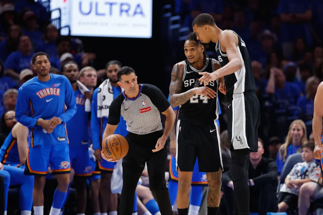 NBA: Playoffs-San Antonio Spurs at Oklahoma City Thunder Spurs star Victor Wembanyama embraces Devin Vassell during Game 1 against the Thunder in the 2025-26 NBA Playoffs.