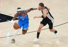 Thunder vs. Spurs Game 4 Pick: 2025-26 NBA Playoffs Predictions and Odds Thunder star Shai Gilgeous-Alexander drives against Carter Bryant during the 2025-26 NBA Playoffs.