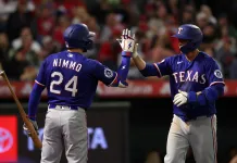 Best MLB Player Props Today (May 27, 2026): Picks & Predictions Rangers players Kyle Higashioka and Brandon Nimmo celebrate against the Angels during the 2026 MLB season.