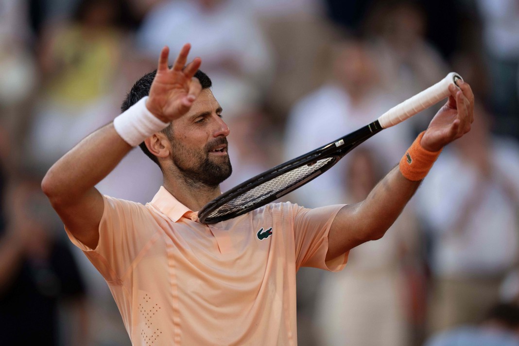Novak Djokovic celebrates a win over Valentin Royer at the 2026 French Open.