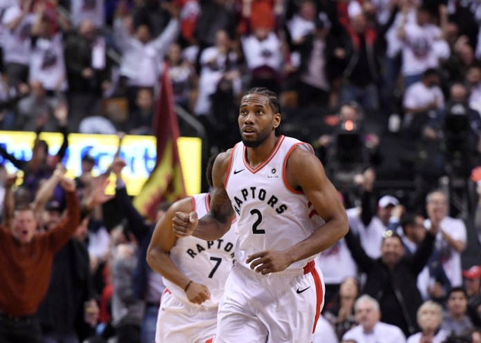 Kawhi Leonard celebrates a shot during the 2019 title run with the Toronto Raptors.