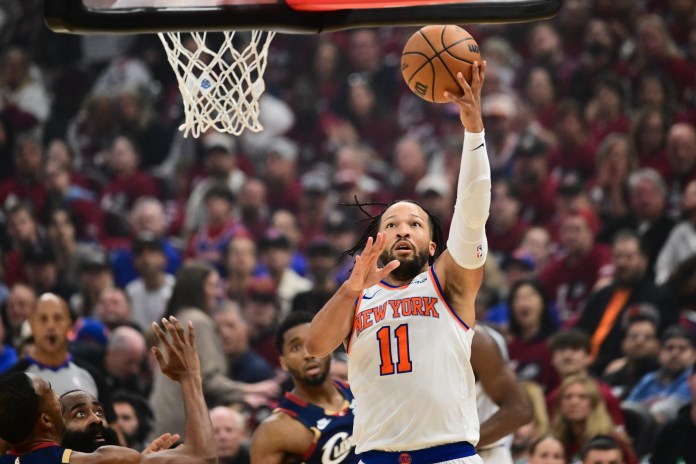 Knicks superstar Jalen Brunson takes a shot at the rim against the Cavaliers during the 2025-26 NBA Playoffs.