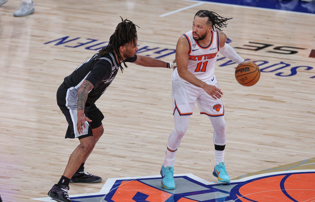 Spurs guard Stephon Castle guards Jalen Brunson during the 2025-26 NBA Finals.
