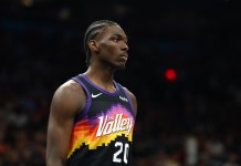 NBA Summer League Best Bets: Picks & Predictions for Friday, July 10 Suns forward Rasheer Fleming looks on against the Jazz during the 2025-26 NBA season.