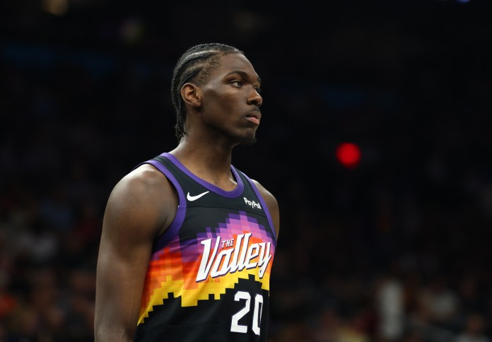 Suns forward Rasheer Fleming looks on against the Jazz during the 2025-26 NBA season.