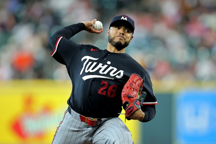 Twins starter Taj Bradley throws a pitch against the Astros during the 2026 season.