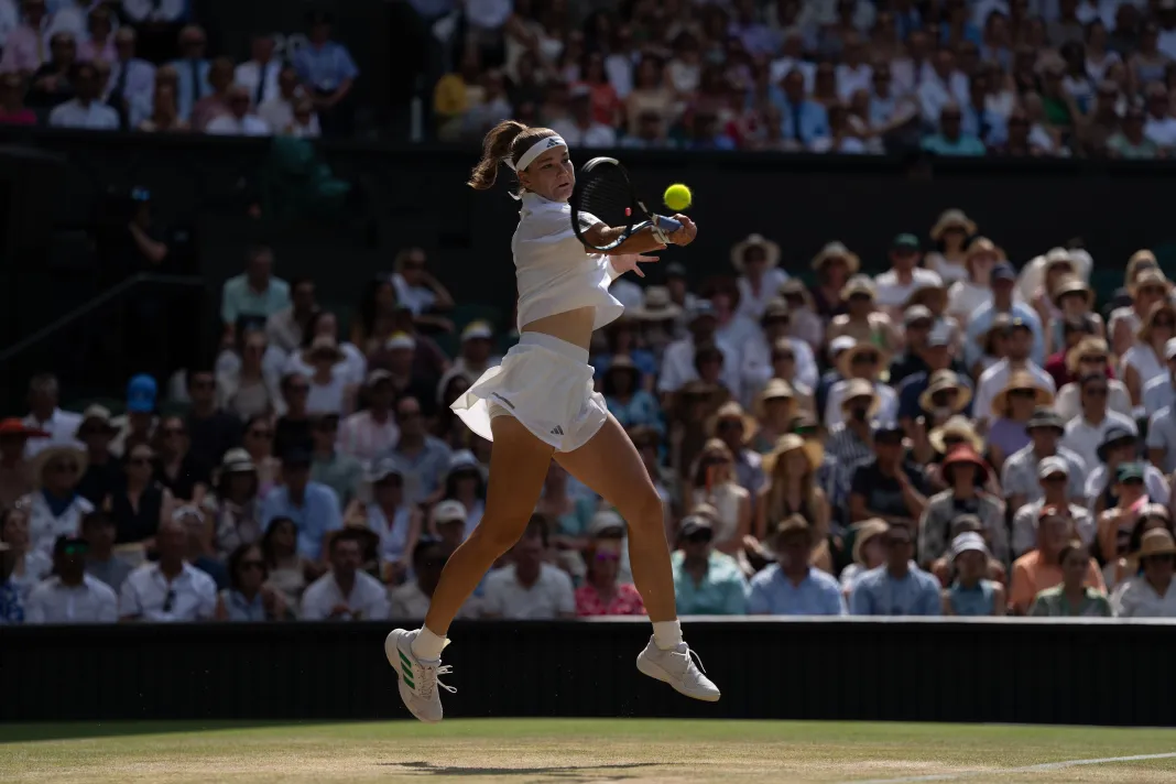 Tennis: The Wimbledon Championships Karolina Muchova hits a forehand against Coco Gauff at the 2026 Wimbledon Championships.