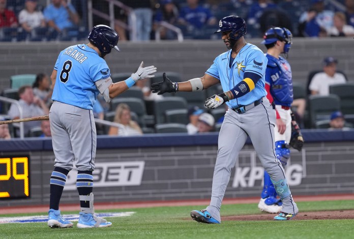 Jonathan Aranda and Yandy Diaz for the Rays.