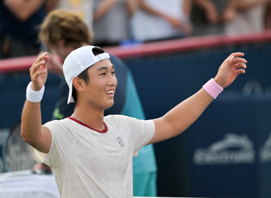 Juncheng Shang celebrates a win over Andrey Rublev at the 2026 National Bank Open.