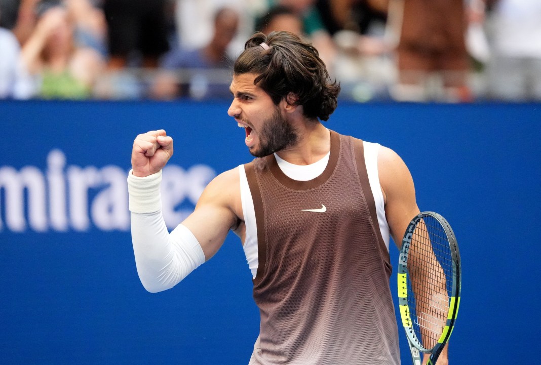 Carlos Alcaraz celebrates a win against Yibing Wu at the 2026 US Open.