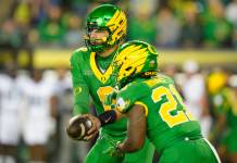 Expert College Football Picks: Week 9 best bets and predictions from Zachary Cohen Oregon QB Dylan Raiola hands the ball off against Portland State during the 2026 college football season.