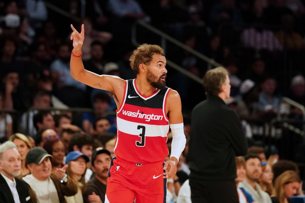 NBA: Preseason-Washington Wizards at New York Knicks Wizards star Trae Young celebrates a shot in preseason against the Knicks.