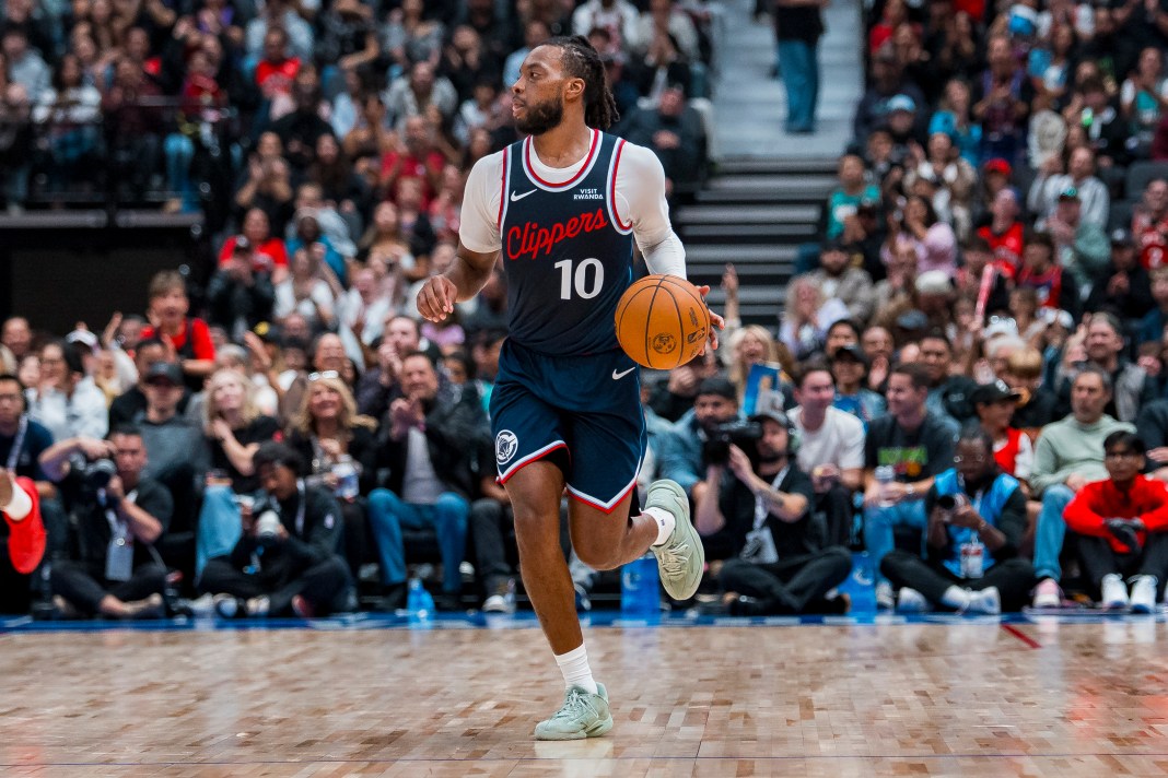 Clippers guard Darius Garland brings the ball up.