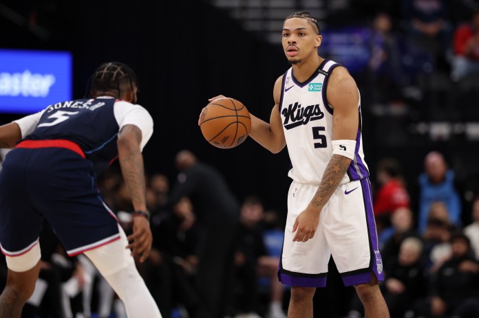 Kings rookie Dariu Acuff Jr. brings the ball up against the Clippers during the 2026-27 NBA season.