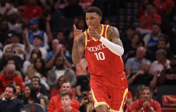Rockets forward Jabari Smith Jr. celebrates a play against the Mavericks during the 2026-27 season.